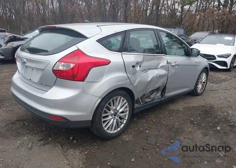 2014 Ford Focus Titanium from USA, damaged, VIN 1FADP3N2XEL125611
